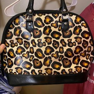DISNEY cheetah print purse